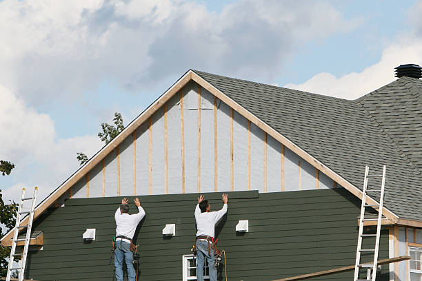 Professional Siding Replacement technician working in Fort Lee, VA